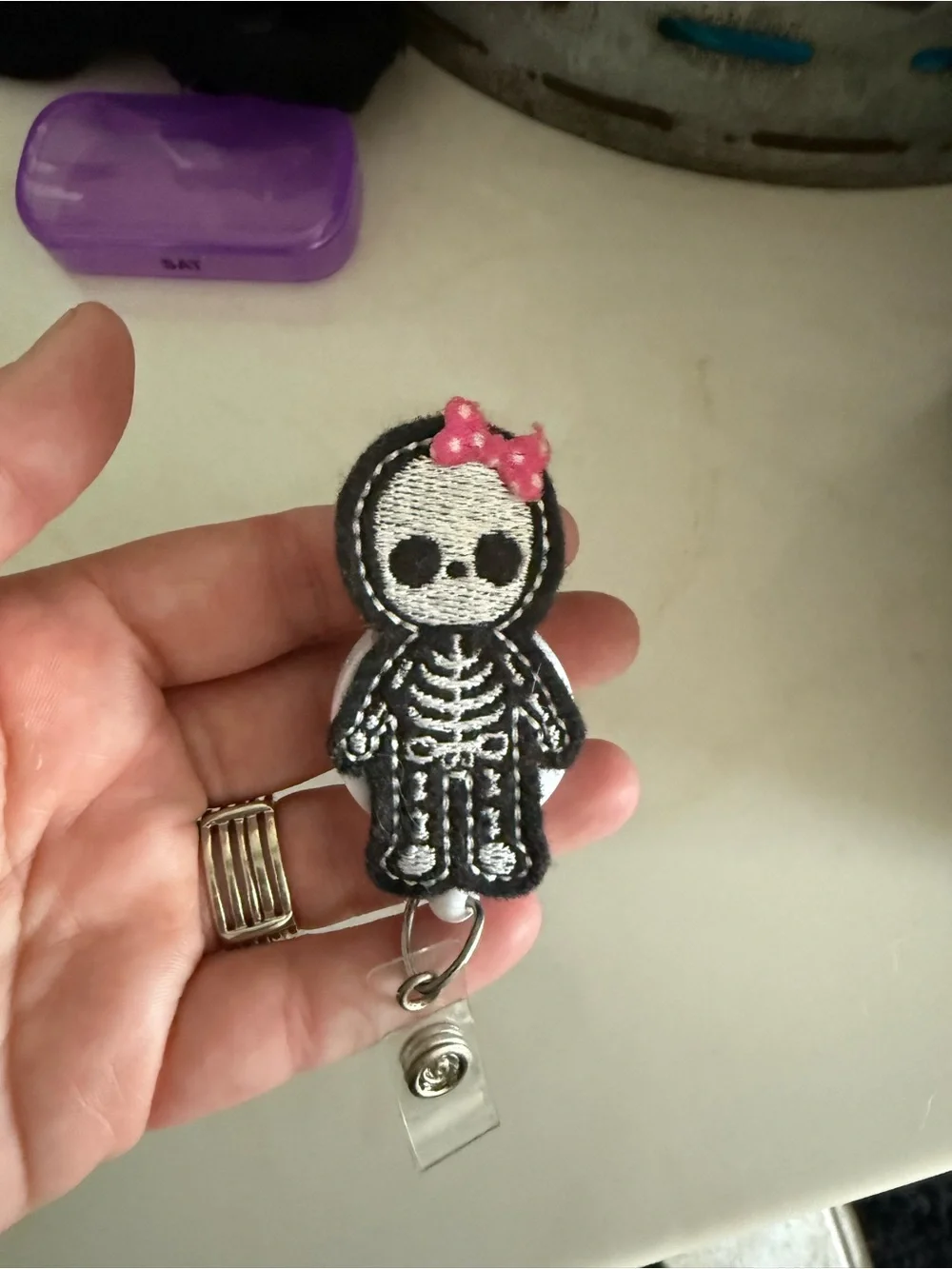 Black Skeleton Badge Reel with Pink Bow